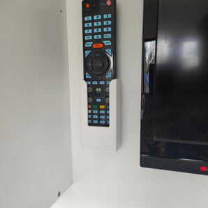 Aan de muur gemonteerde Konka TV-afstandsbedieningshouder