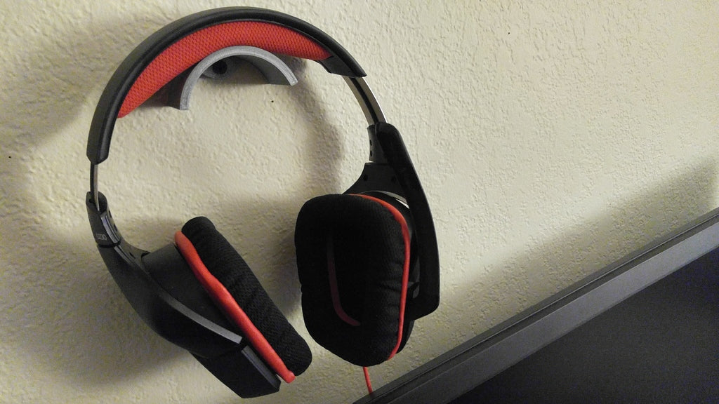 Aan de muur gemonteerde hoofdtelefoon- en kabelhouder