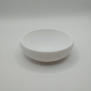 Platte minimalistische schaal voor sleutels en munten