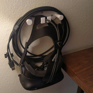 Wandhouder voor VR-headset met kabelopslag