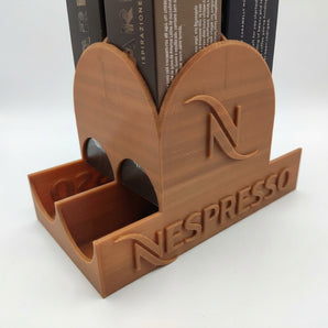 Nespresso dispenser met koepeldop voor het bewaren van capsules