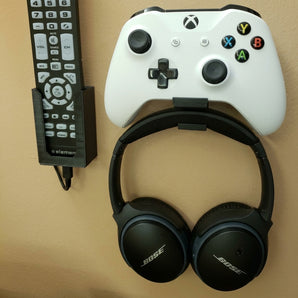Slimme wandhouder voor gamingcontroller, hoofdtelefoon en afstandsbediening