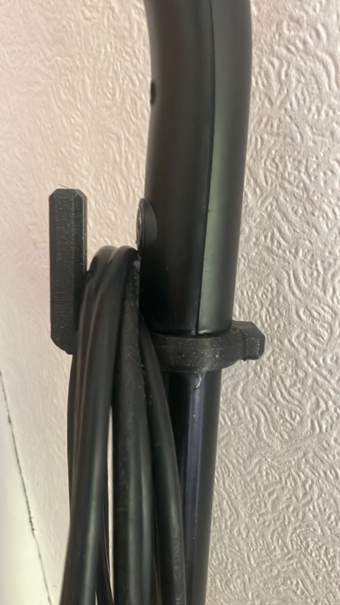 Praktische kabelhaak voor stoommop en stofzuiger