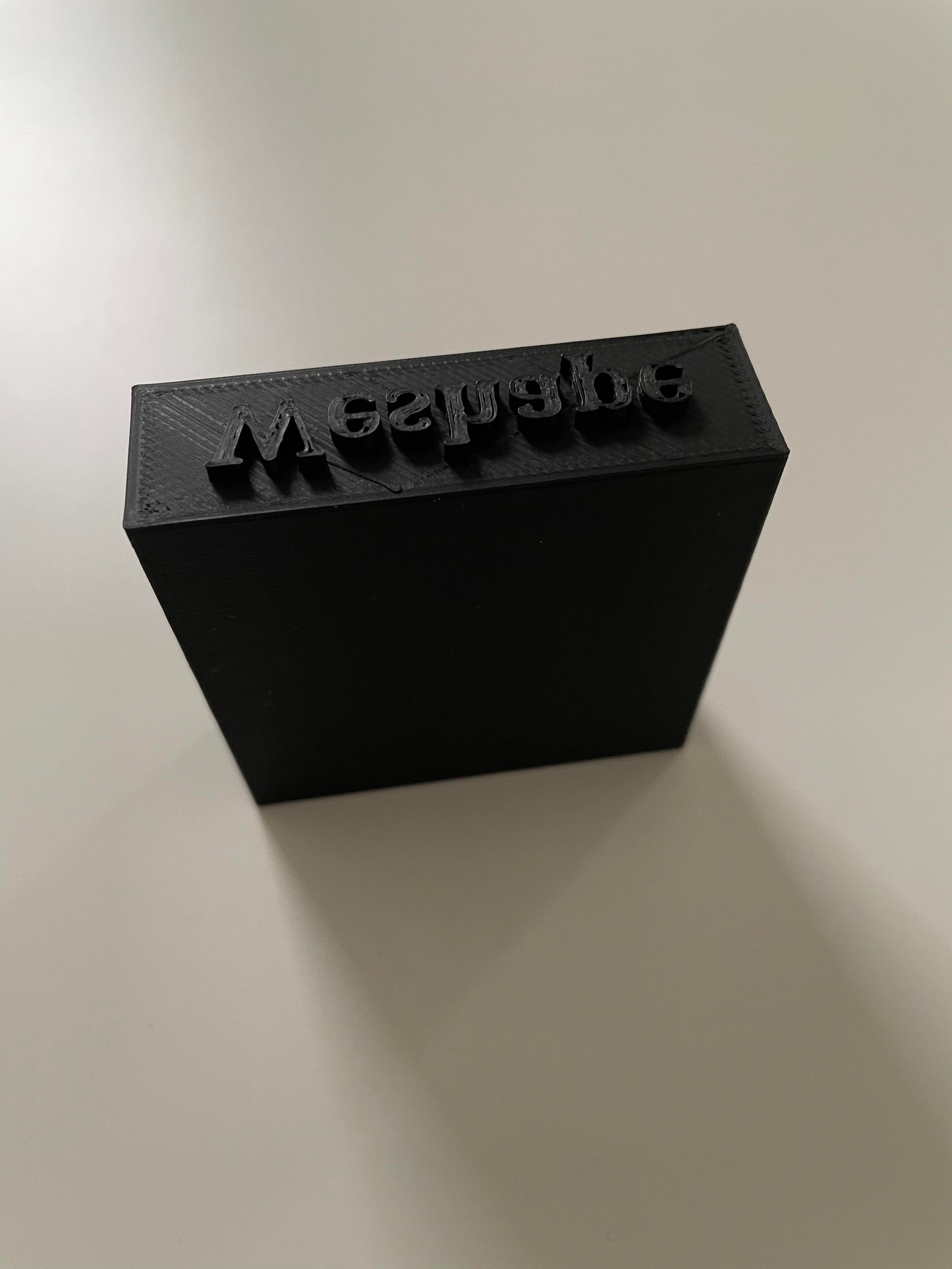 Sort stempel med tekst