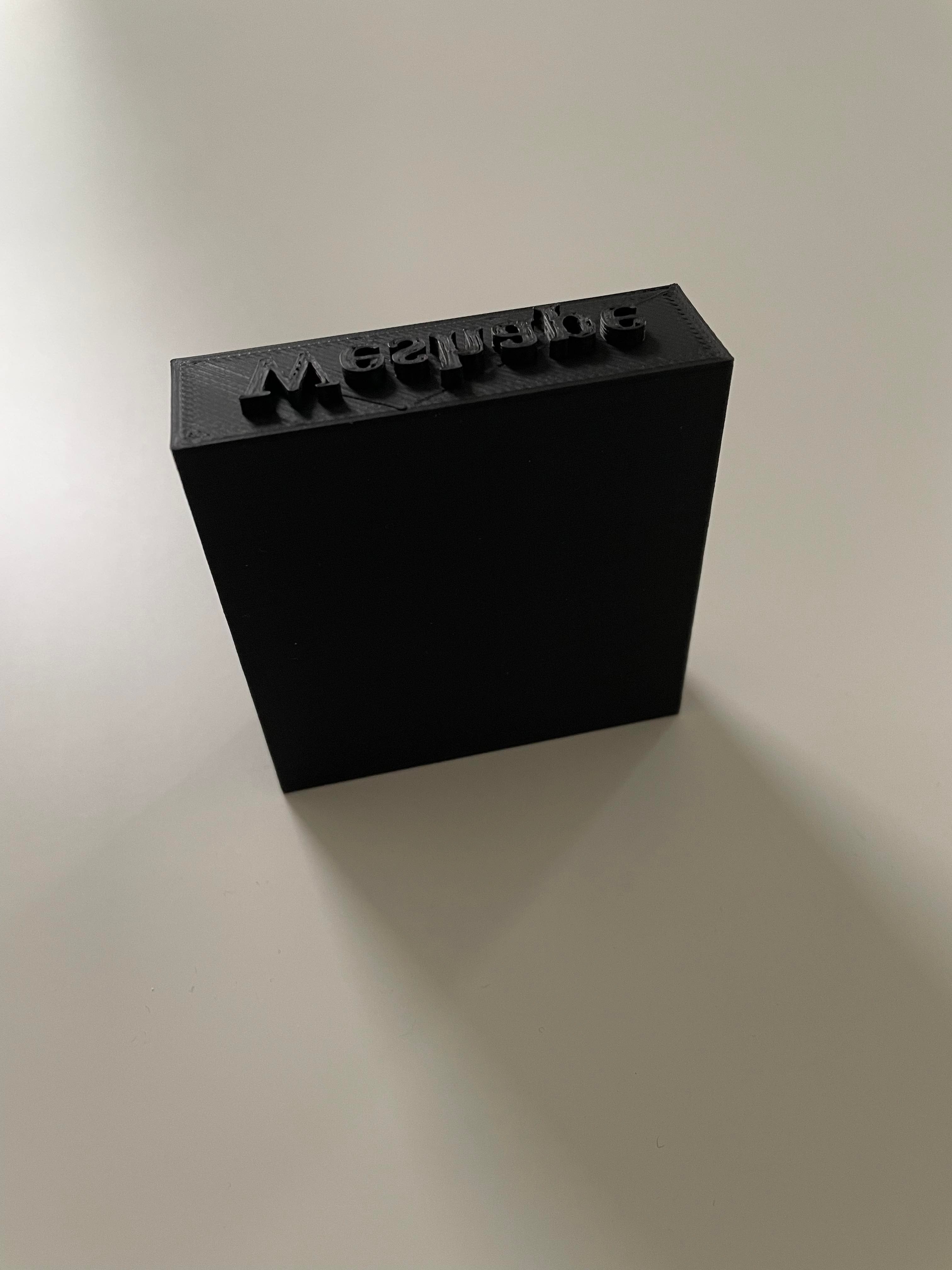 Sort stempel med tekst