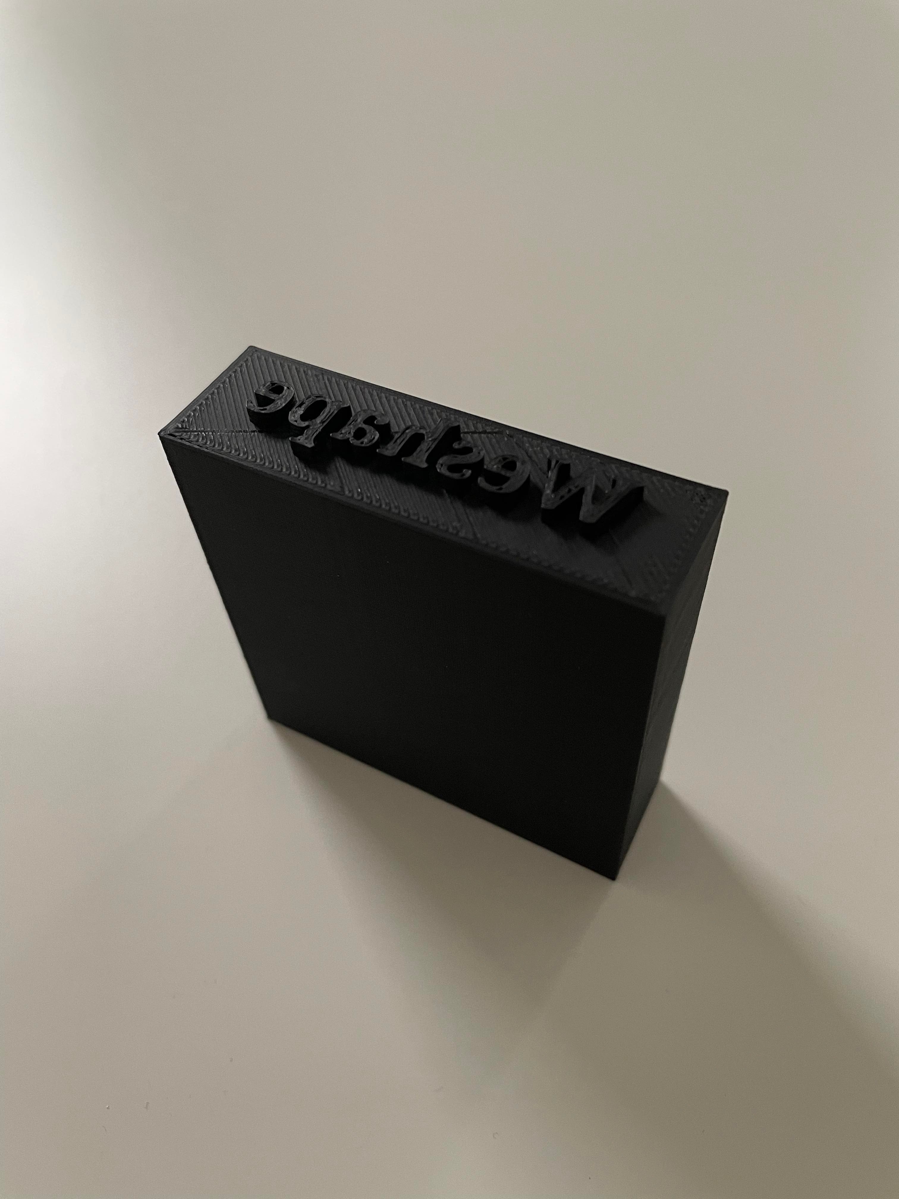 Sort stempel med tekst