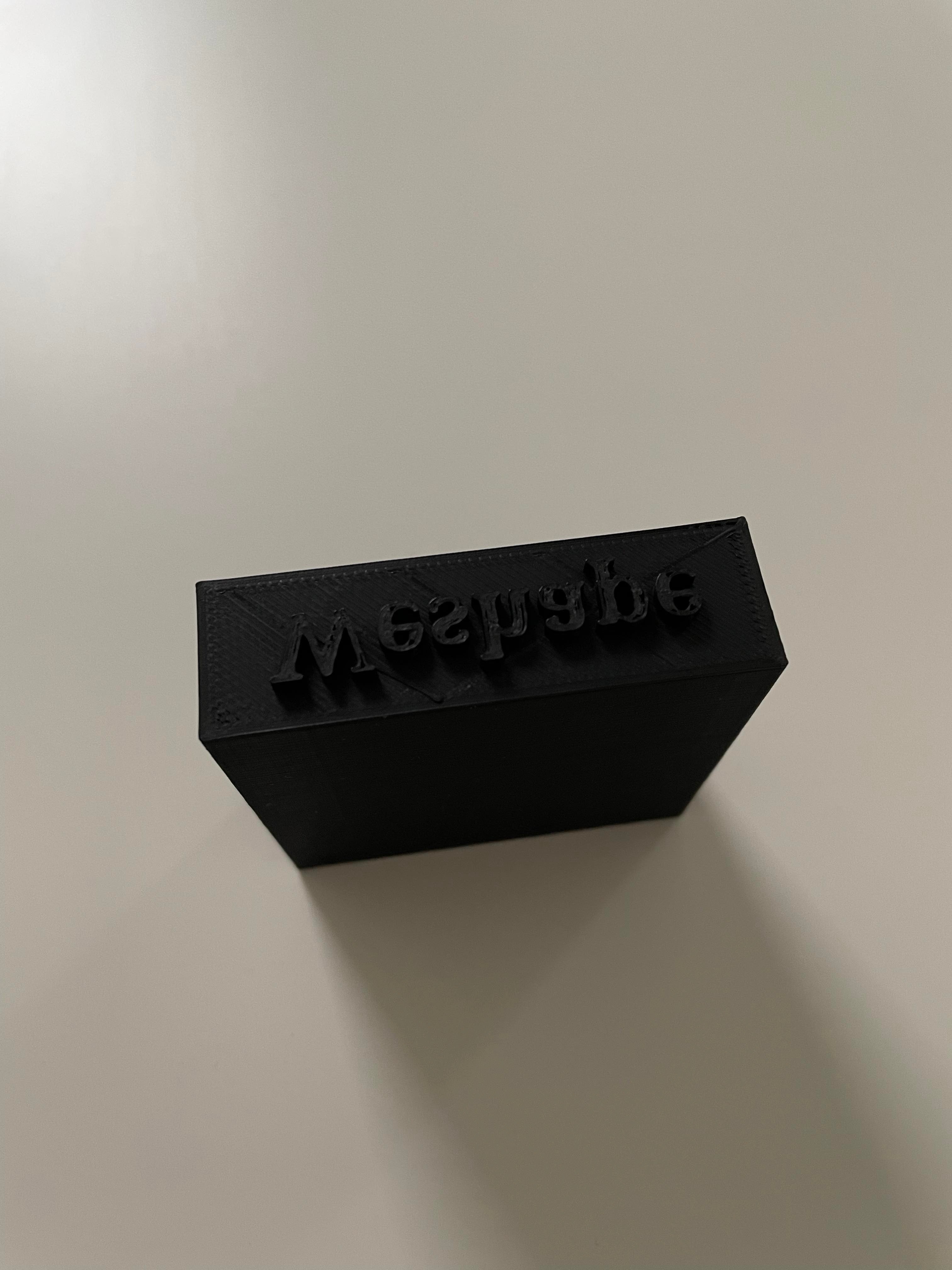 Sort stempel med tekst