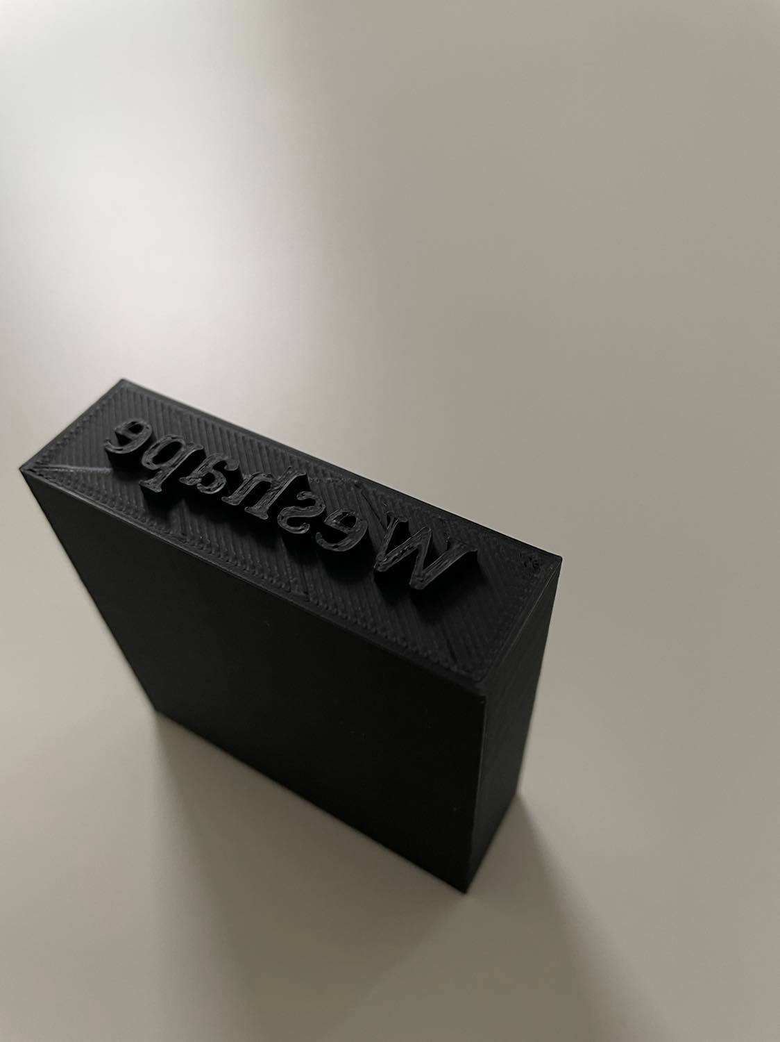 Sort stempel med tekst