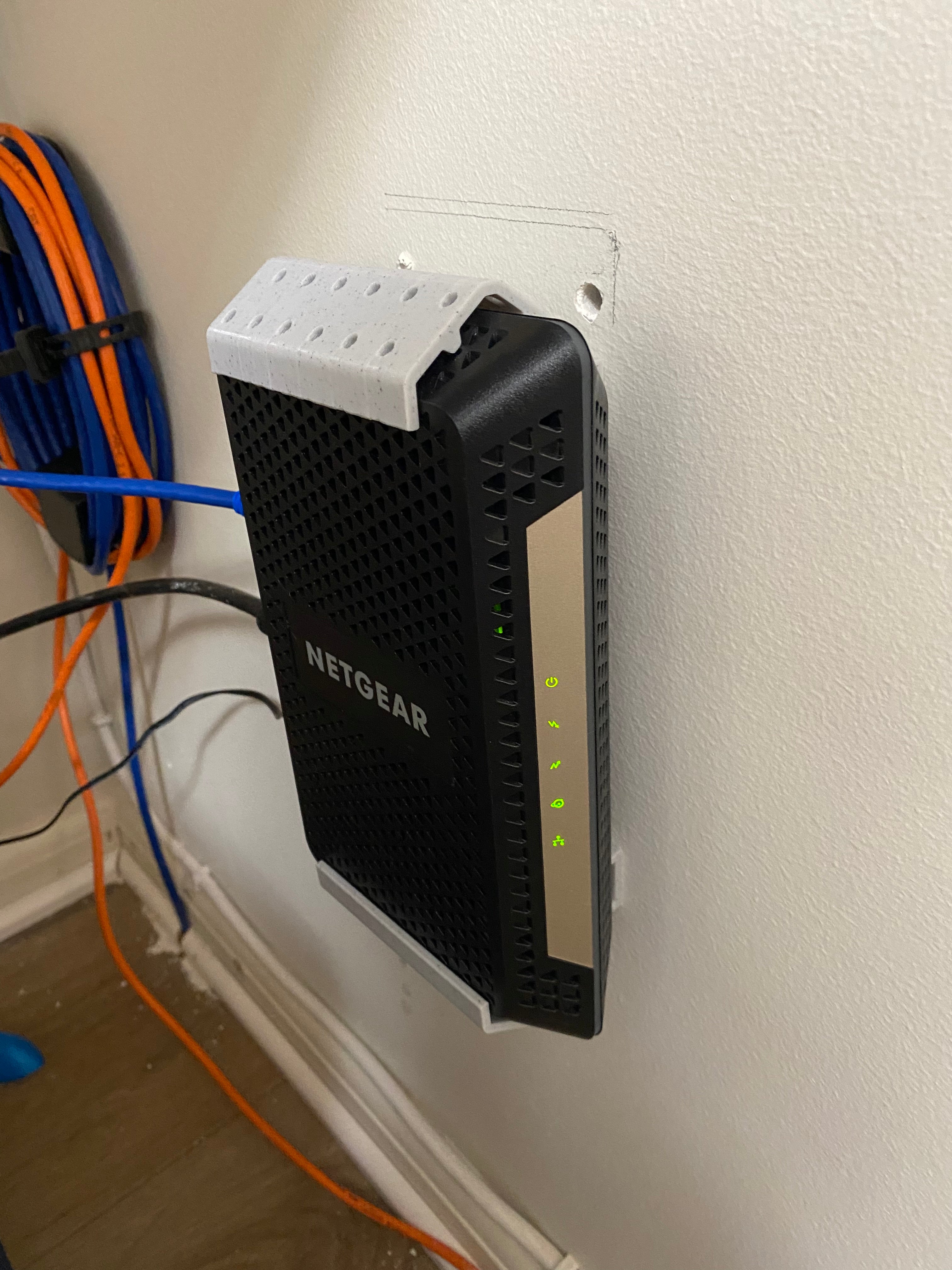 Netgear CM600 / CM1000 Wandmontage – Optimaliseer uw netwerksetup