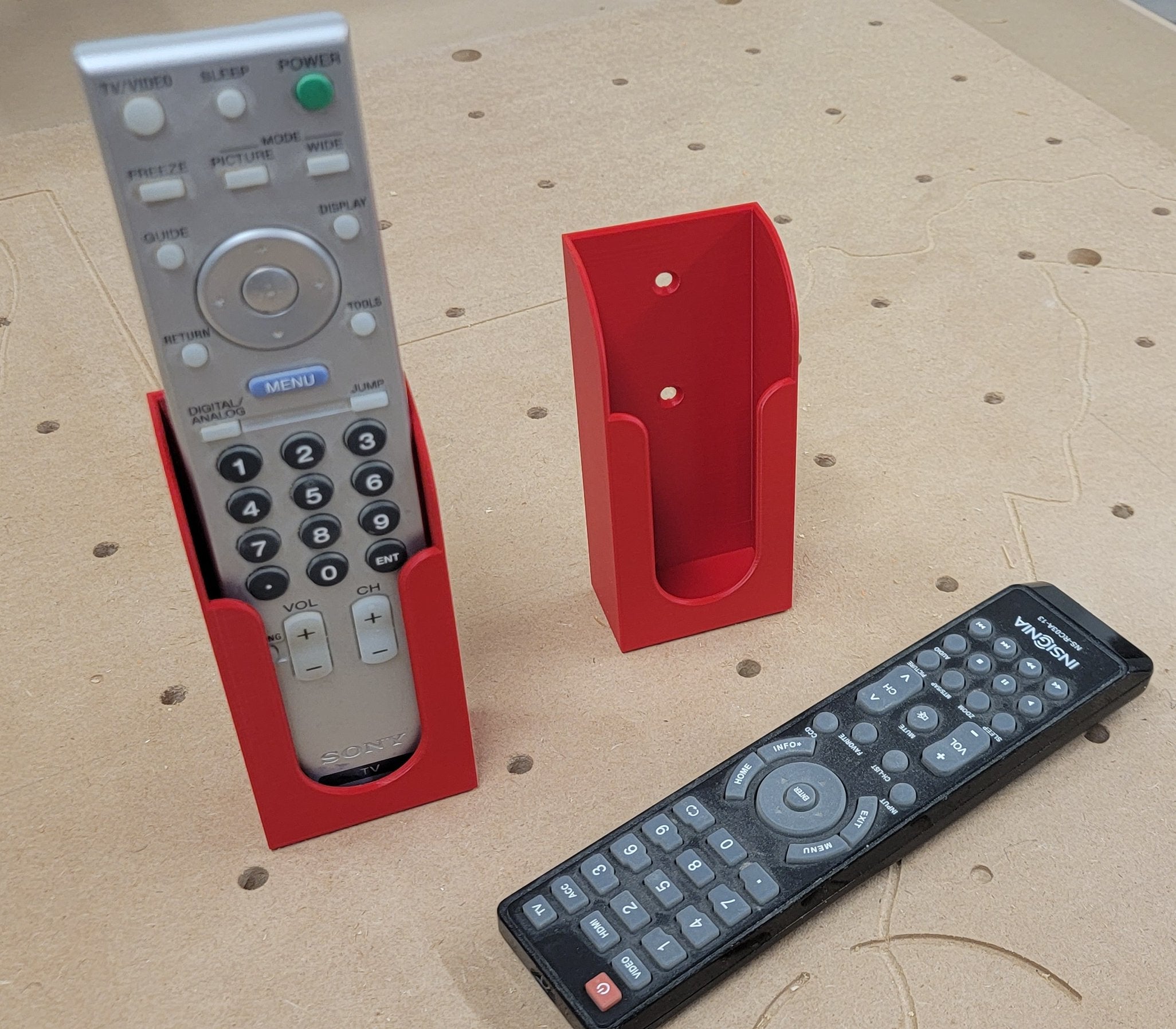 Houder voor afstandsbediening voor montage met houtschroeven