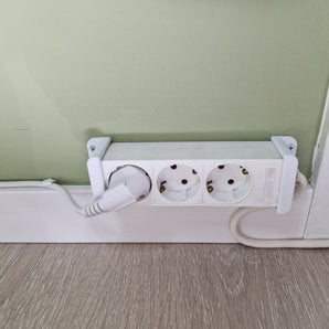 Praktische beugel voor verlengkabel