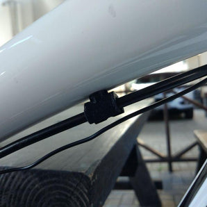 Remleidingklem en kabelhouder voor fiets