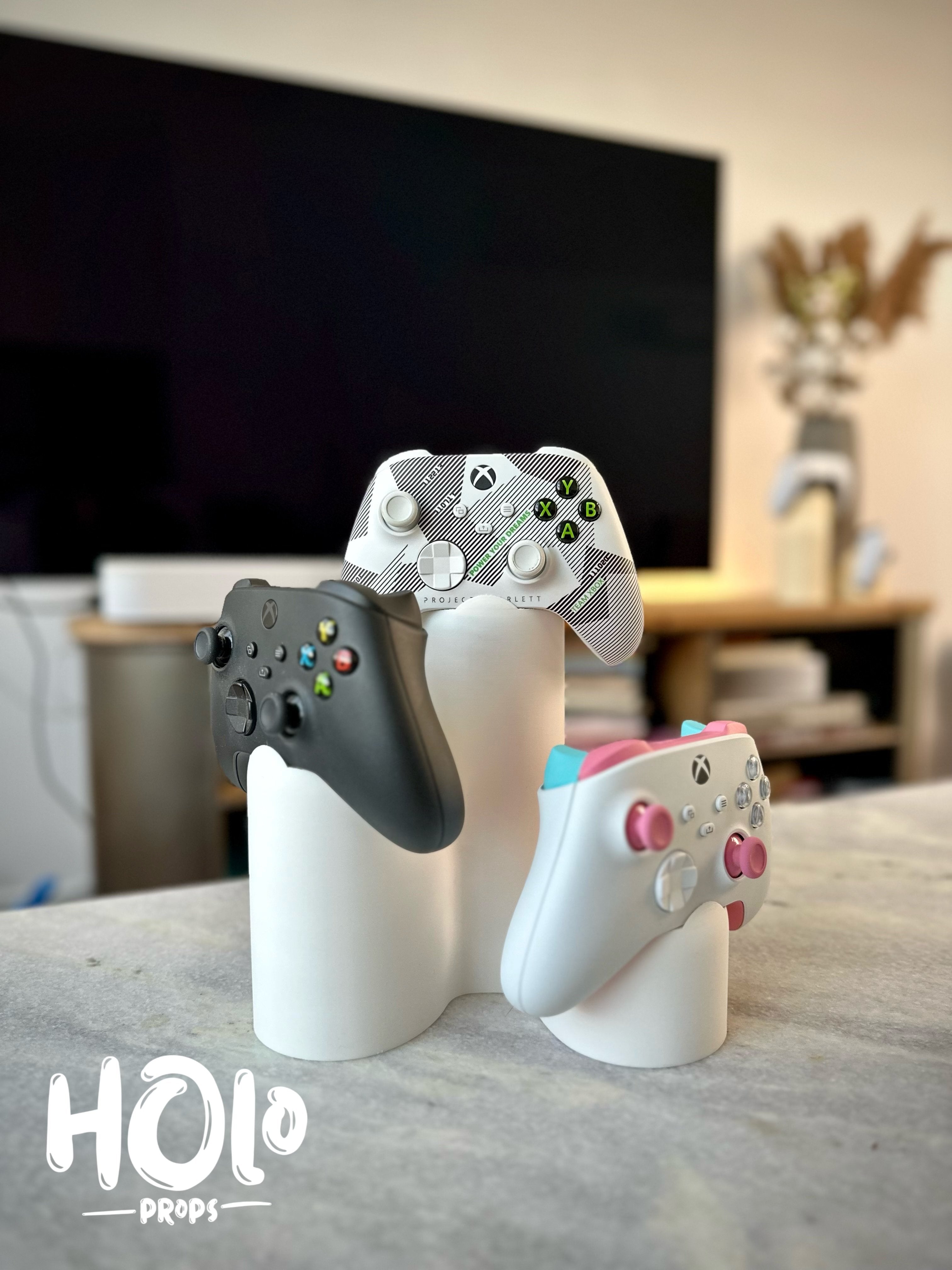 Moderne standaard voor drie PlayStation Xbox controllers