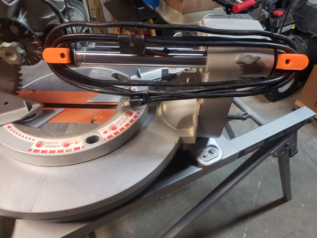 Ridgid verstekzaag snoer oprol beslag