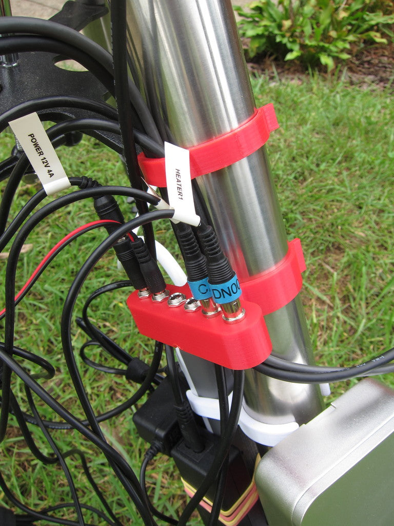EXOS-2 Kabelhouder met Optionele 12V Stroomverdeling