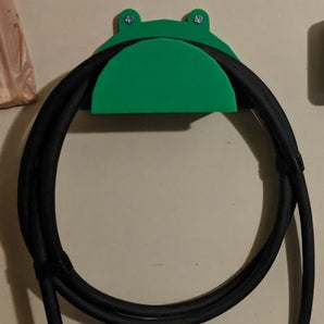 Tesla-laadkabelophanging voor georganiseerd opladen