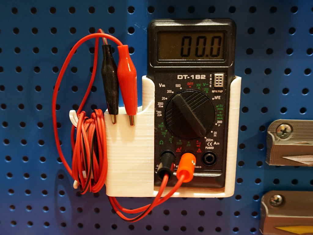Flexibele multimeterhouder voor wand- en pegboardmontage