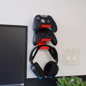 Praktische wandhouder voor twee controllers en headset