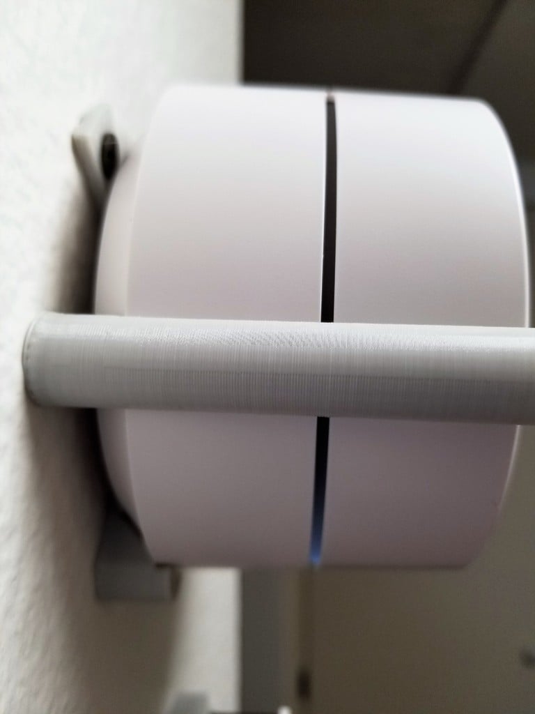 Minimalistische wandmontage voor Google WiFi