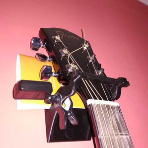Veilige wandhouder voor gitaar