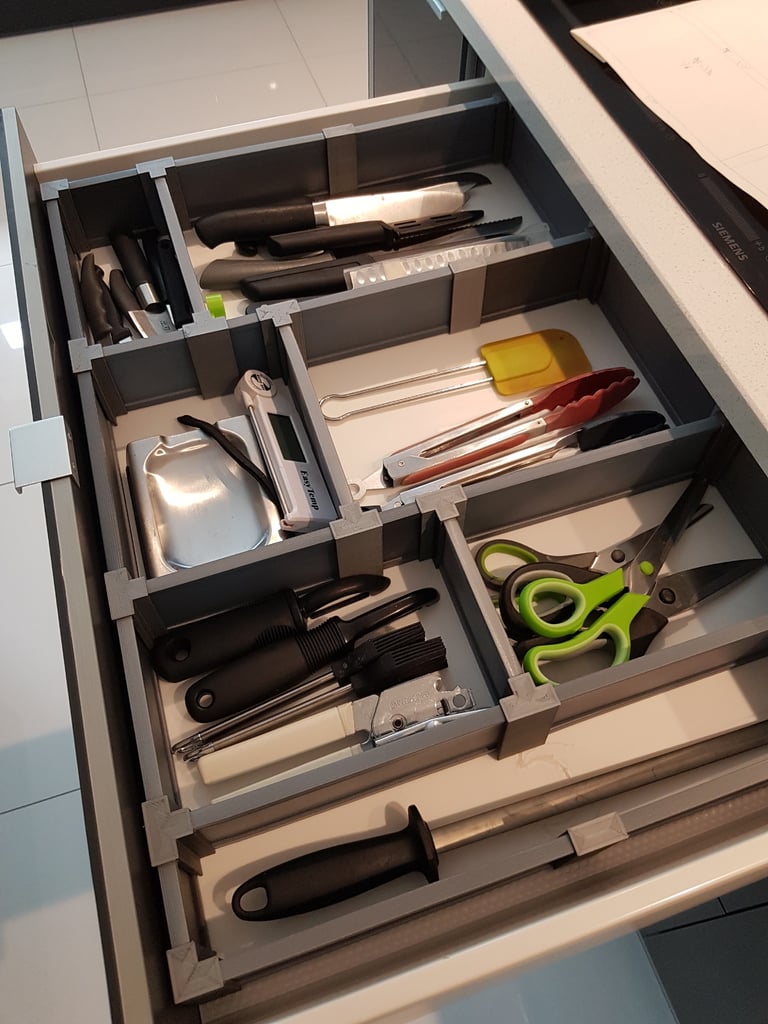 Modulair en verstelbaar lade-indelingssysteem