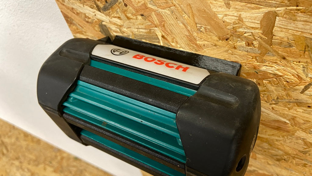 Wandgemonteerde houder voor Bosch 36V batterij