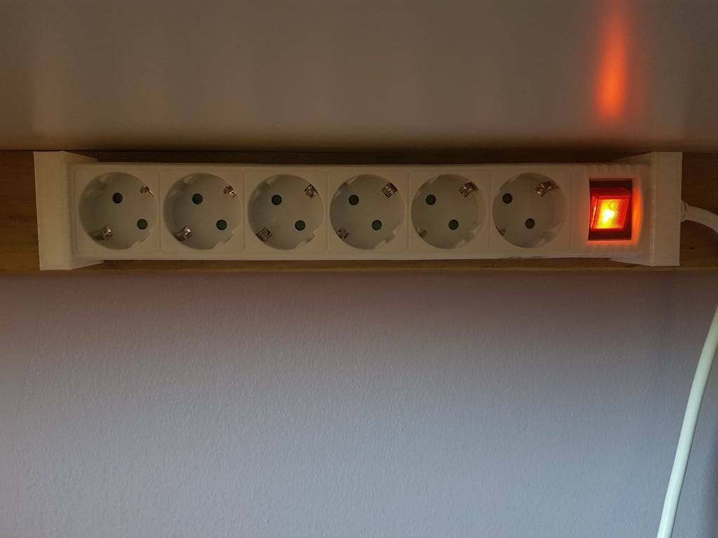 Multifunctionele kabelhouder voor stroomkabels