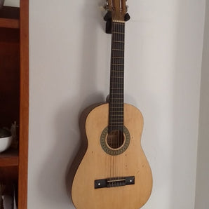 Muurbeugel voor gitaar

Robuust ontwerp voor akoestische & elektrische modellen