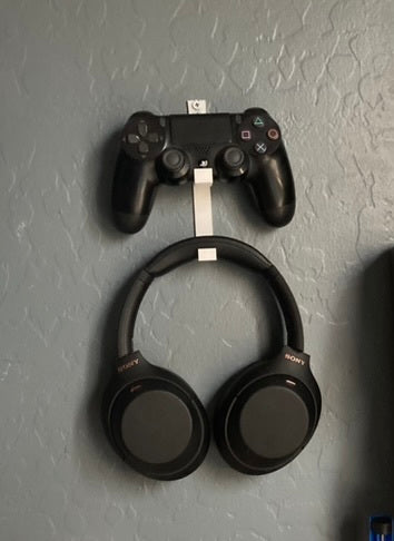 Muurbevestigde houder voor PS4-controller en koptelefoon