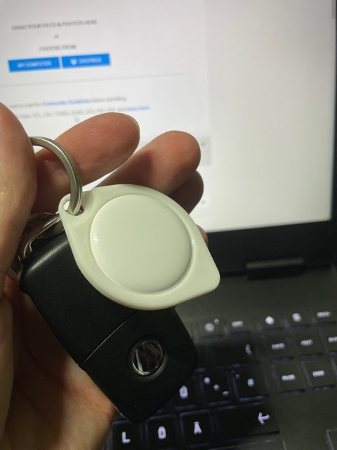 Minimalistische AirTag sleutelhanger