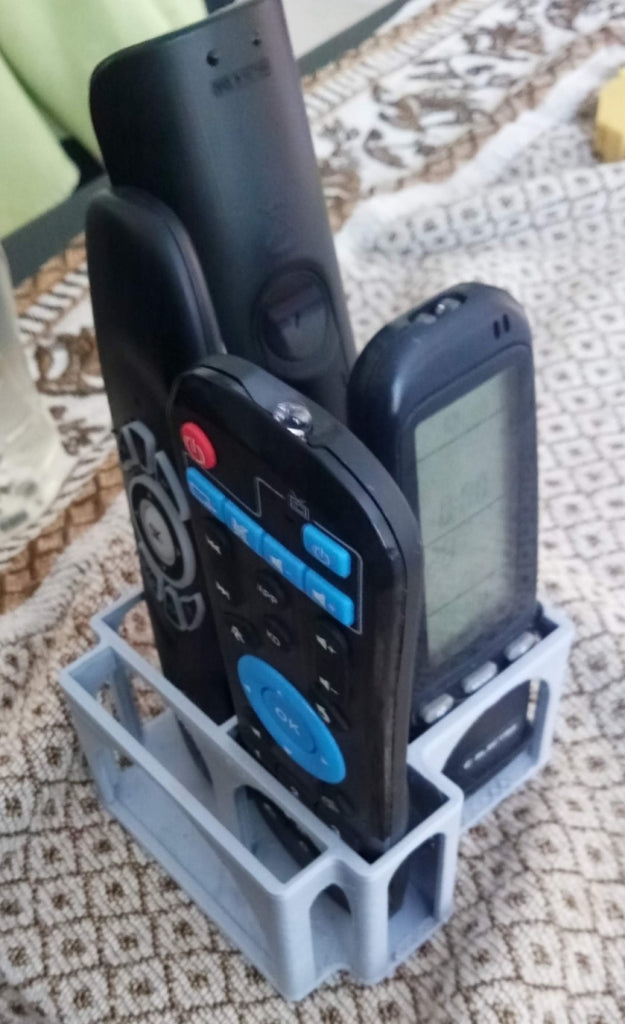 Houderdoos voor afstandsbediening met smartphonehouder