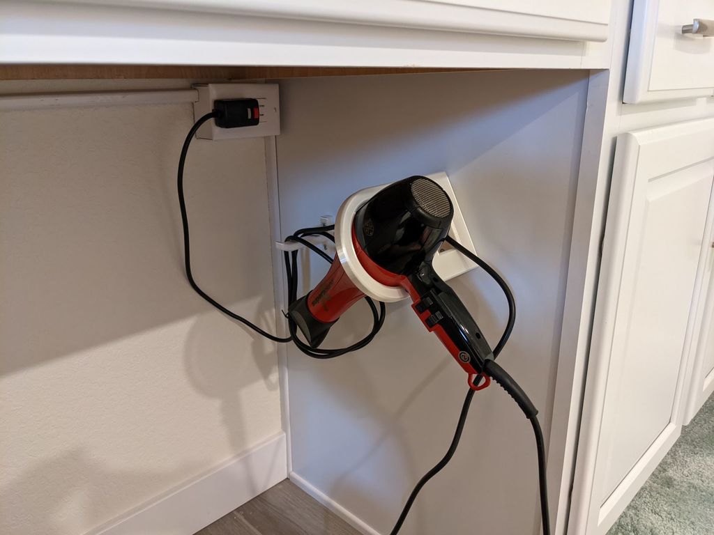 Haardrogerhouder voor zijmontage met kabelhaak
