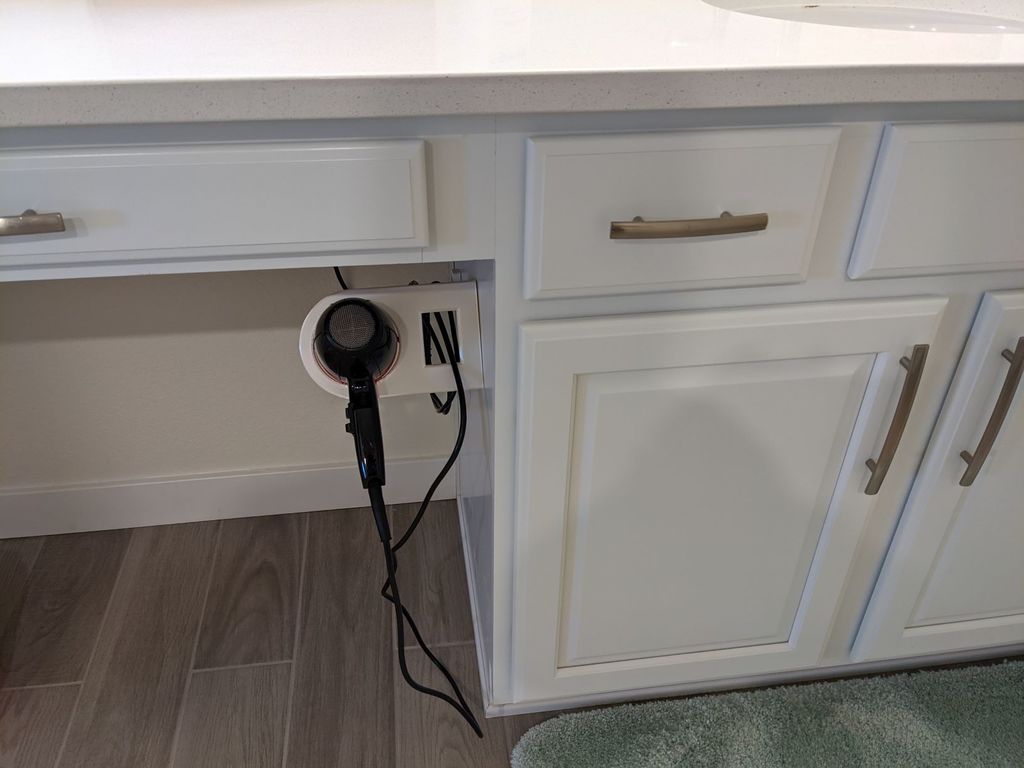 Haardrogerhouder voor zijmontage met kabelhaak