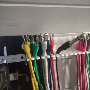 Skadis Eurorack Kabelhouder
