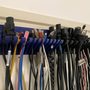 Universele kabelhouder voor wandmontage