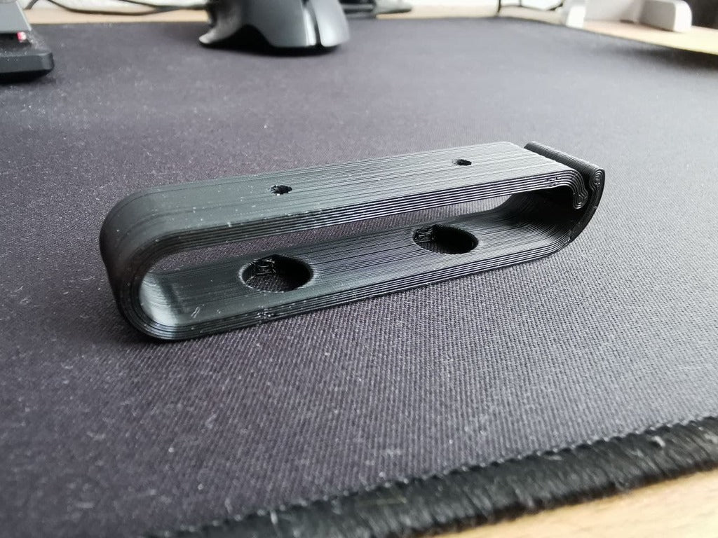 Universele kabelbeheerclips