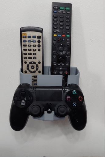 Wandgemonteerde houder voor afstandsbedieningen en PS4-controller