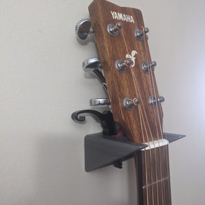 Wandmontage voor gitaar met accessoirehouder