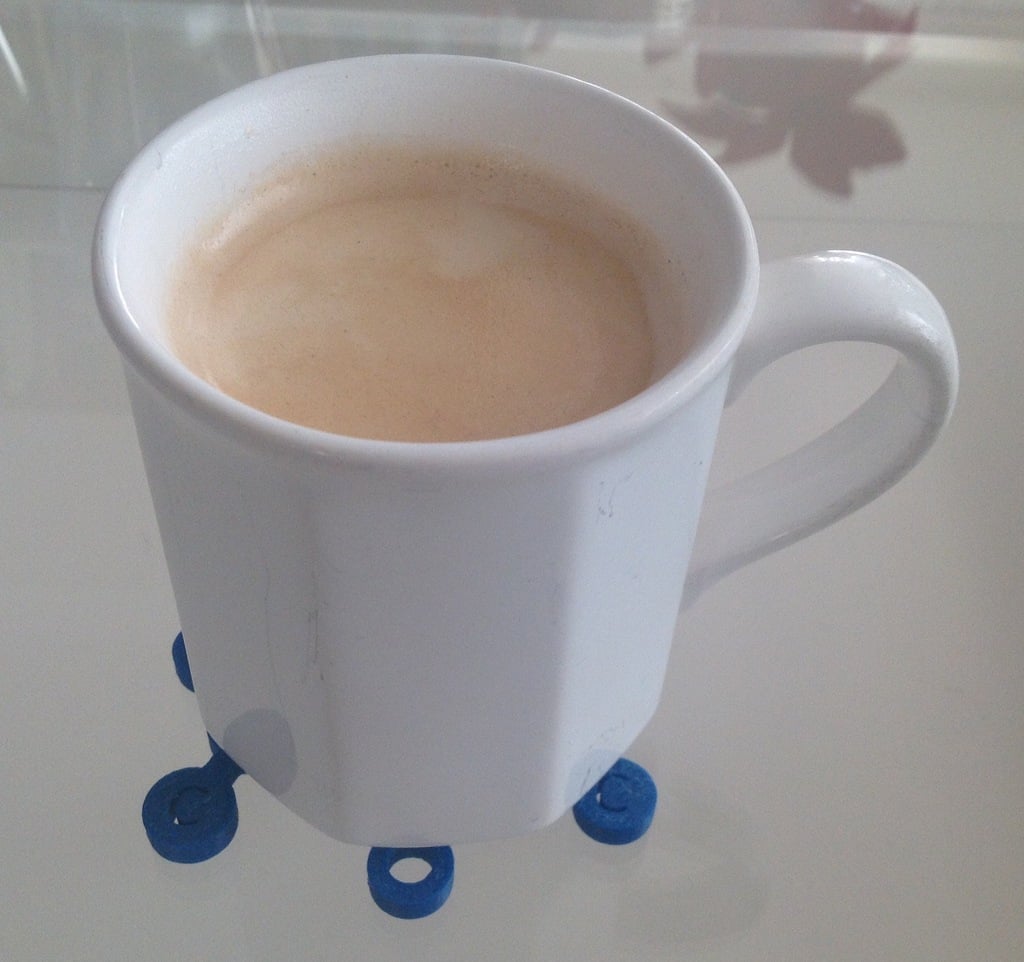 Cafeïnemolecuul placemat voor koffiekopjes