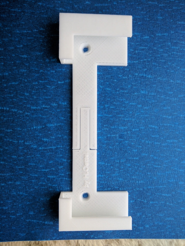 Flexibele muurbevestiging voor tablet met veilige hoekclip