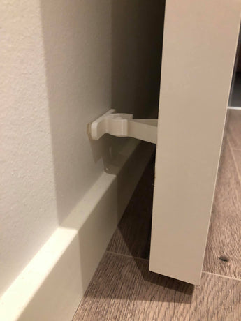 Dørstopper monteret på dør