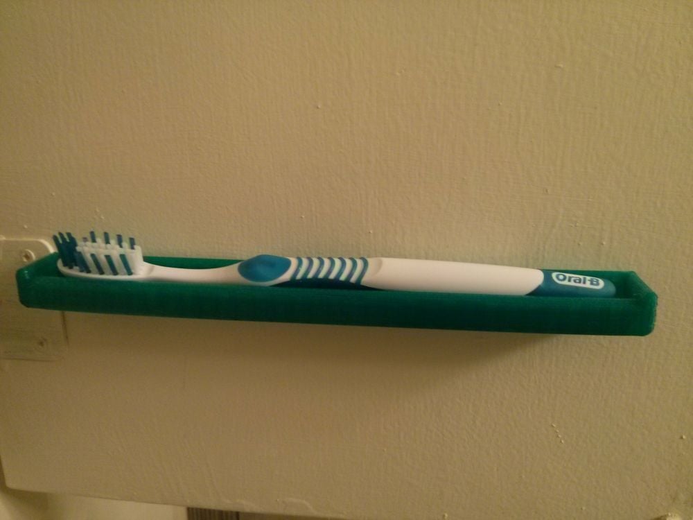 Ruimtebesparende tandenborstelhouder