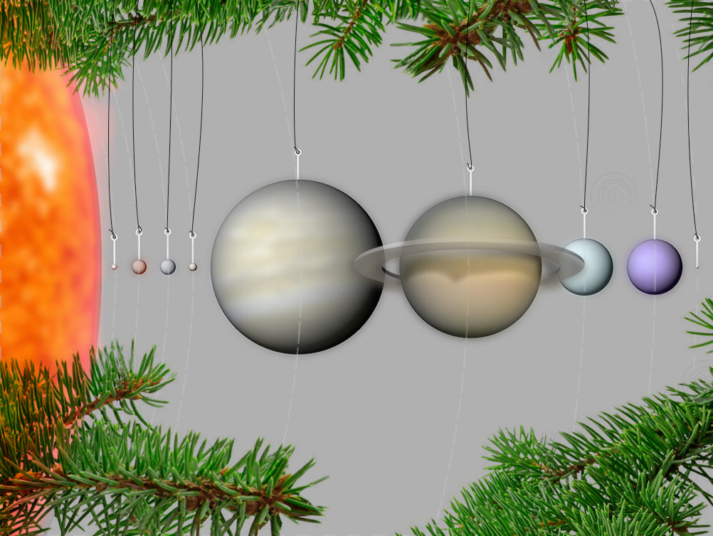 Schaalmodellen van ons planetenstelsel als kerstboomversieringen