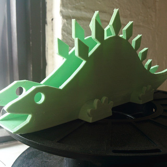 Aanpasbare Stegosaurus servethouder
