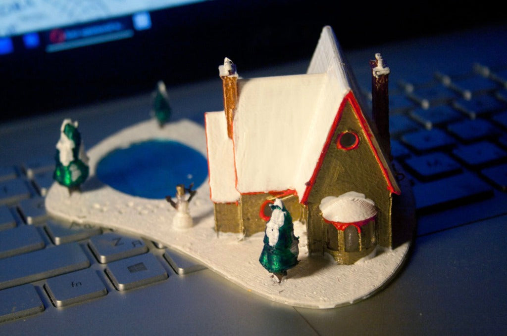 3D-geprint kersthuis met bevroren meer