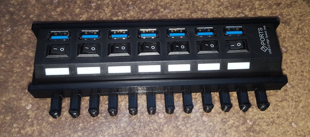7-poorts USB-hubhouder met draadgeleider