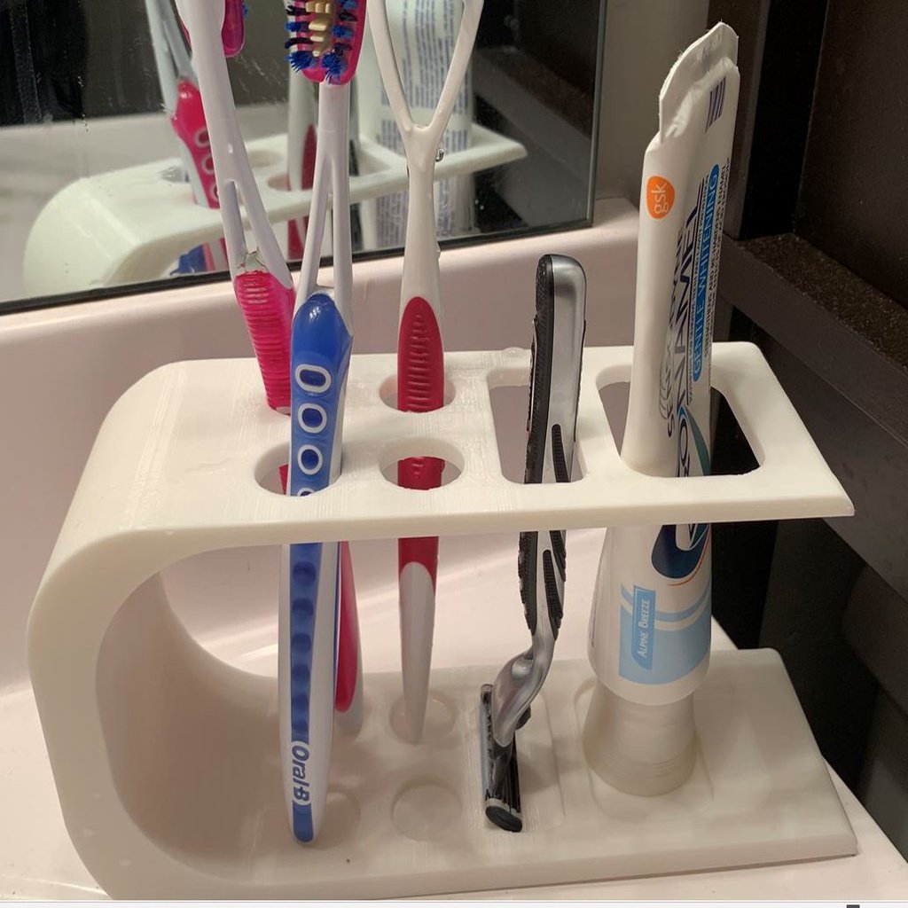 Tandenborstelhouder met scheermeshouder en tandpastabuishouder